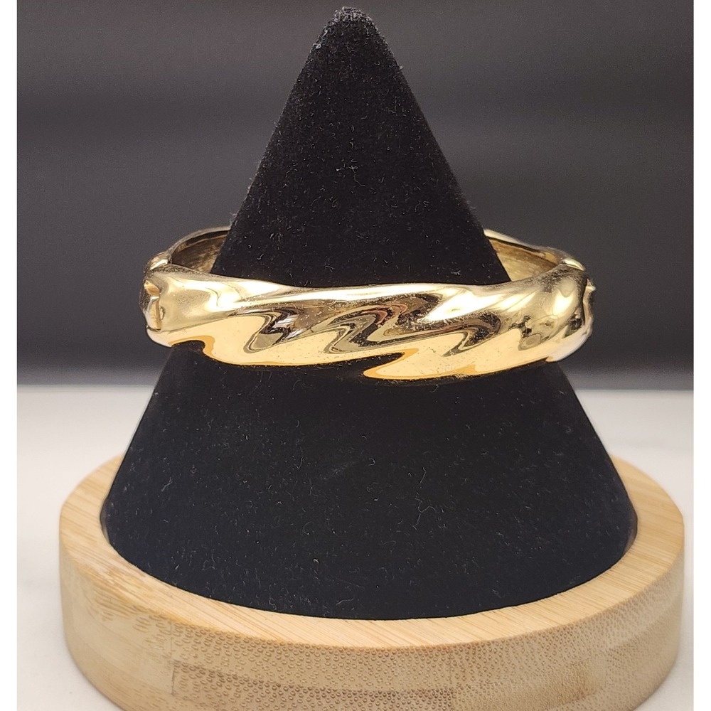Monet Gold Tone Twisted Wave Hinged Bangle Bracelet with Safety Chain